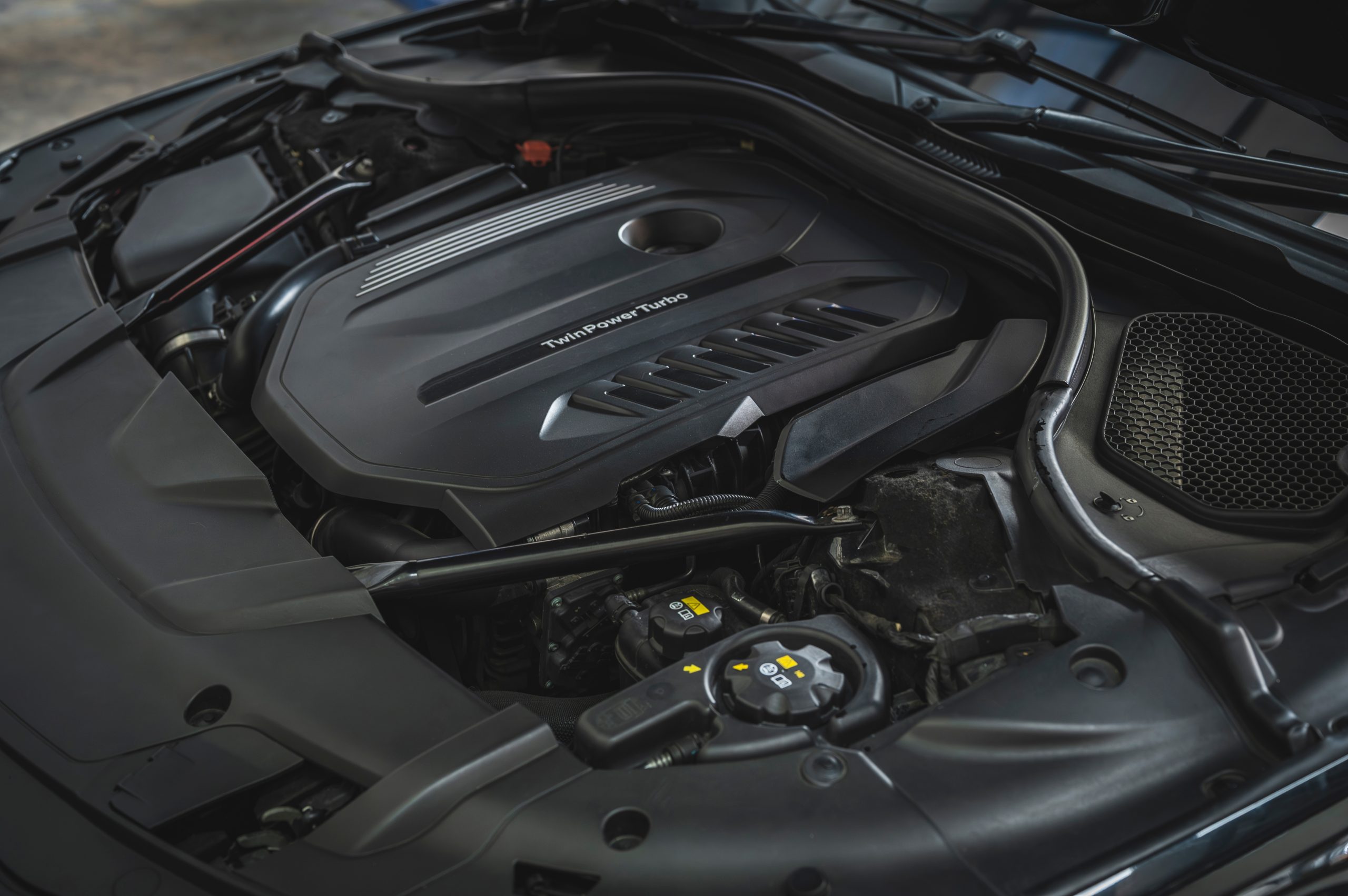 Clean TwinPower Turbo engine bay of a high-performance vehicle ready for professional maintenance and service.