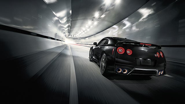 2023 Nissan GT-R seen from behind driving through a tunnel | Nissan of Visalia in Visalia CA